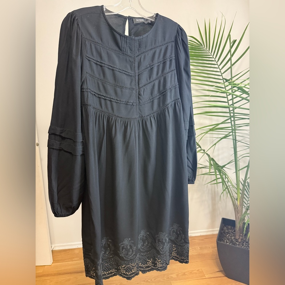 Soaked in luxury dress